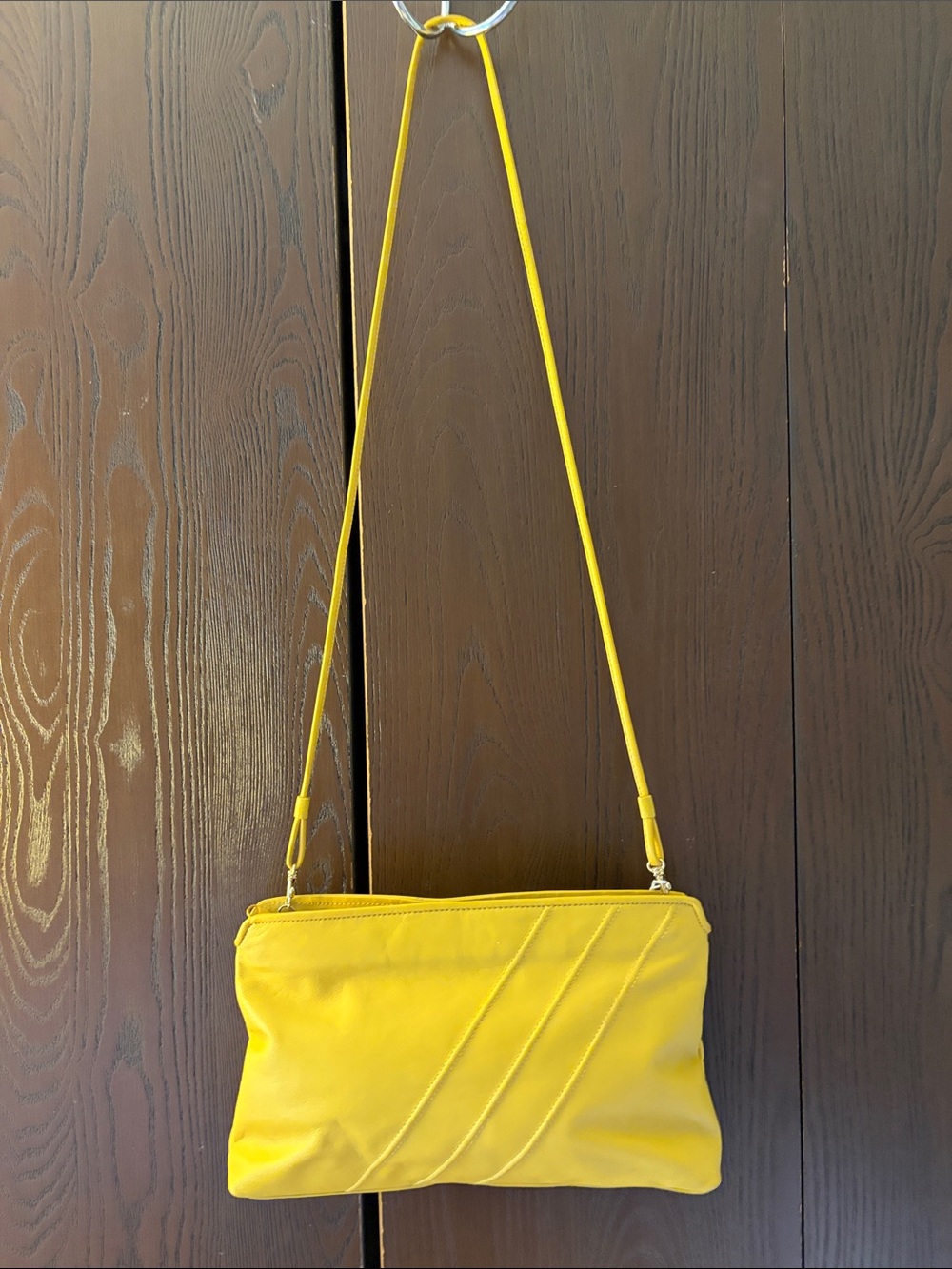 Axiom vintage gold 1980’s genuine leather crossbody or clutch purse.